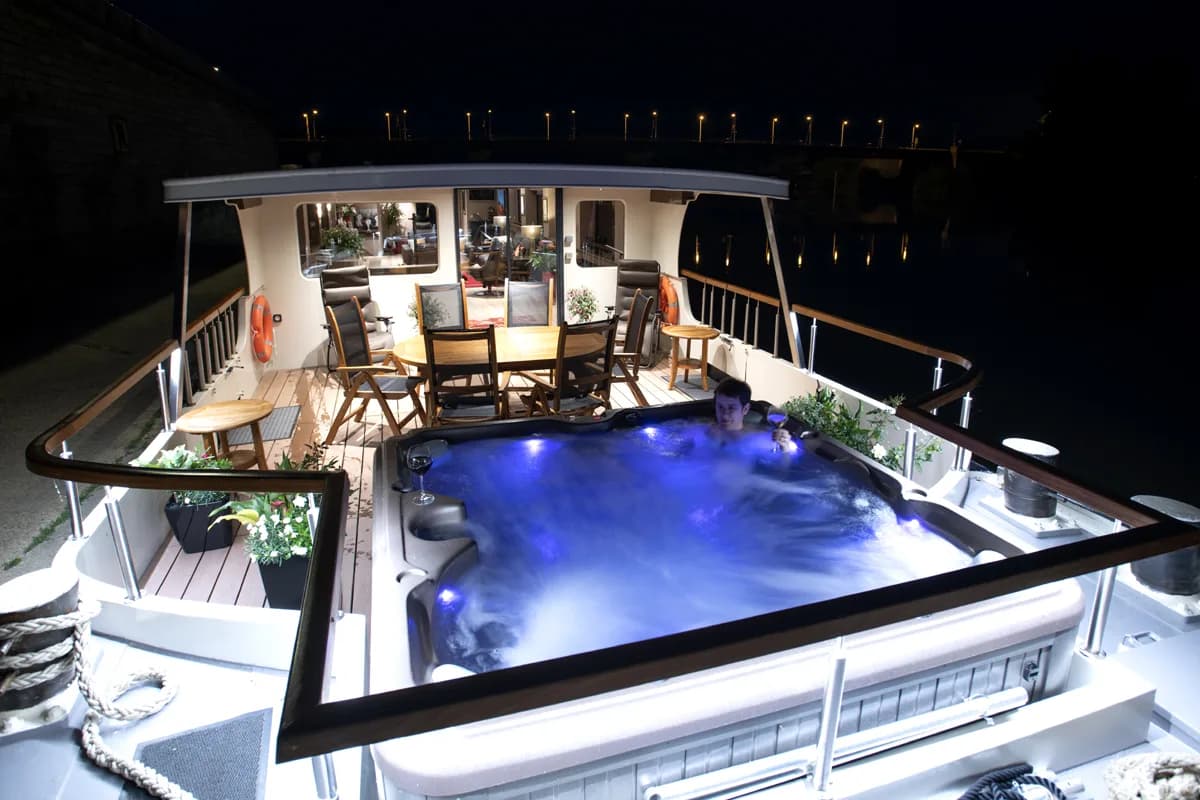 The hot tub on deck at night
