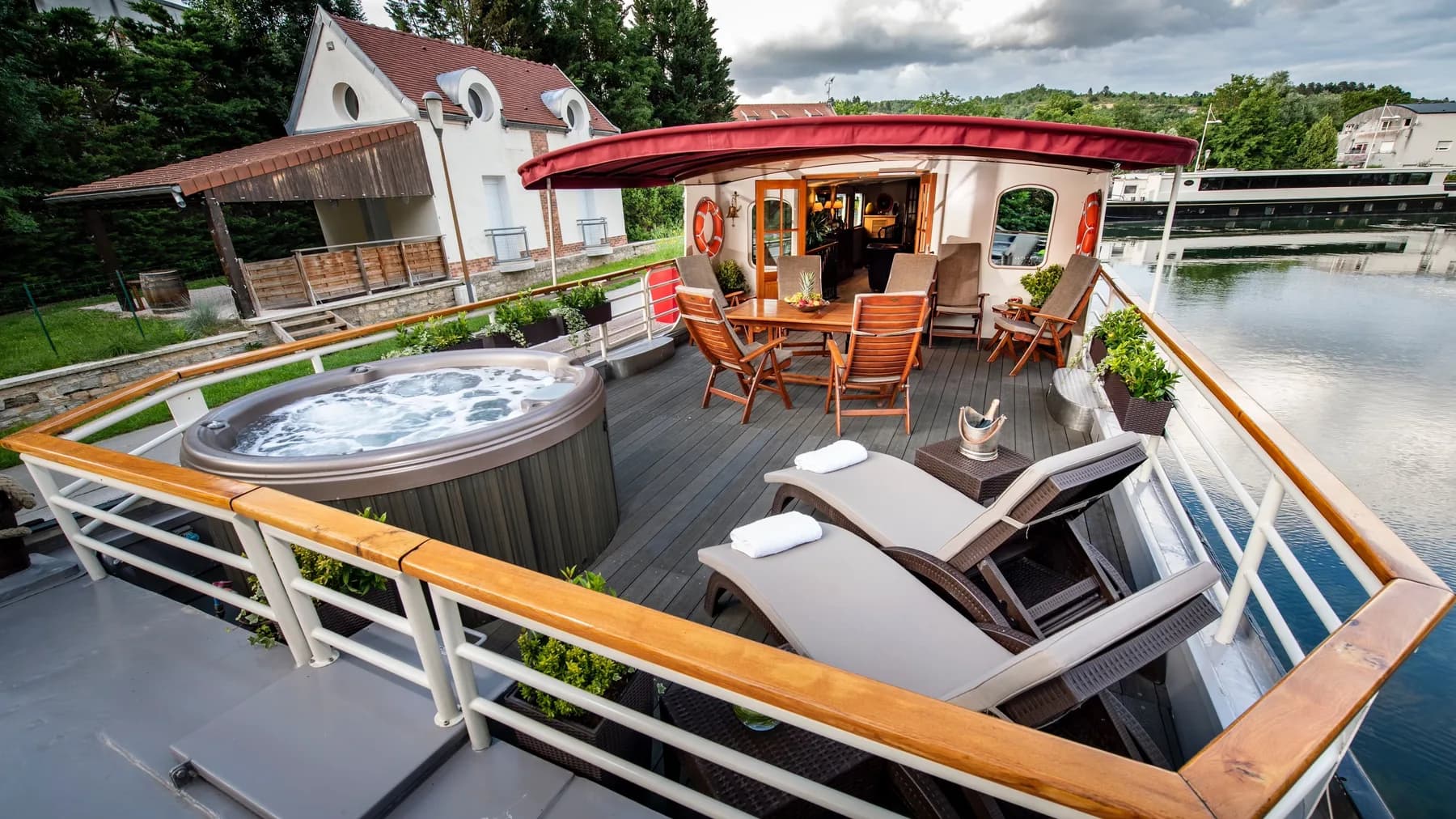 The hot tub and loungers on the sun deck