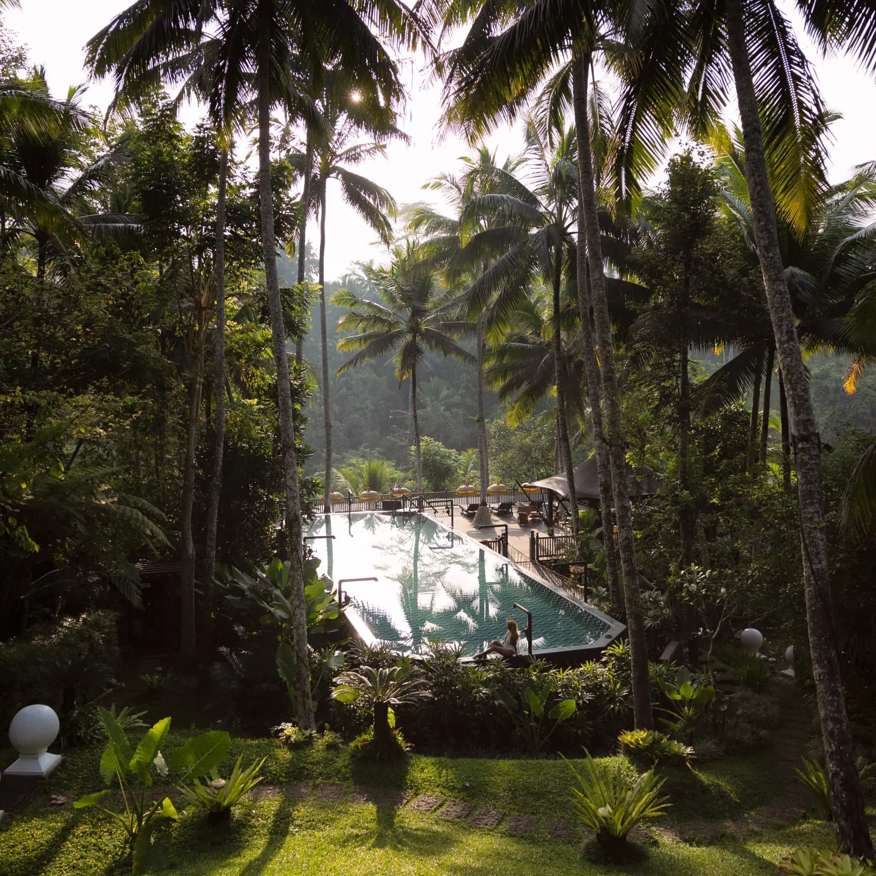The pool at Capella Ubud, in the rainforest
