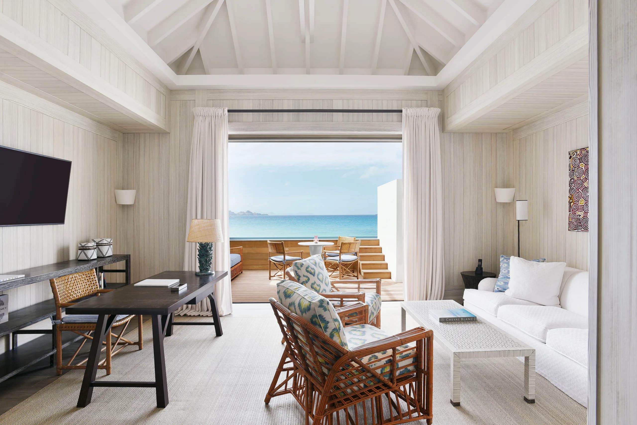 A suite living room opening onto the sea at Cheval Blanc St-Barth Isle de France