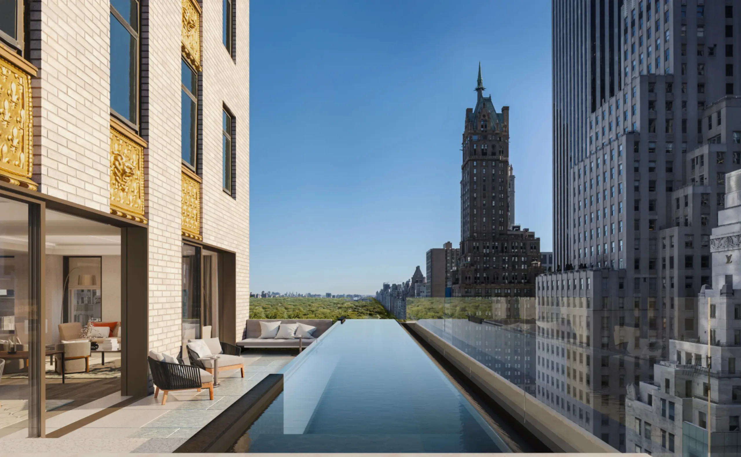 A terrace lap pool at Aman Residences, New York, looking north over Central Park, with the Crown Building's gilded facade to the left.
