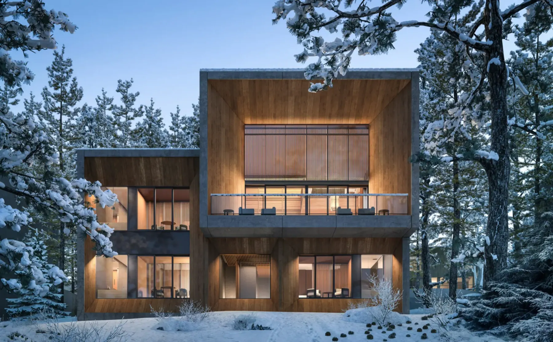 A timber-clad villa at Aman Niseko lit from inside on a snowbound slope, its upper terrace open beneath deep eaves, with birches and pines around it.