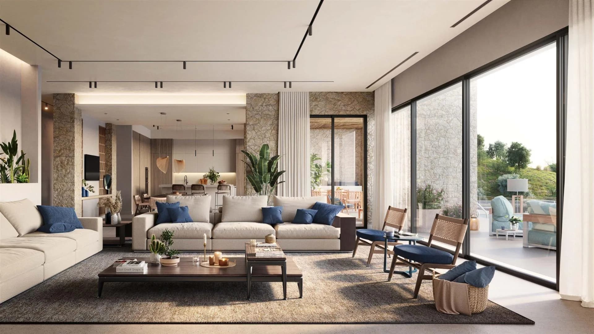 The living room of a villa at Elounda Hills, a long sofa and dining table beneath a timber ceiling, glazed the full width of the room to the Gulf of Mirabello.