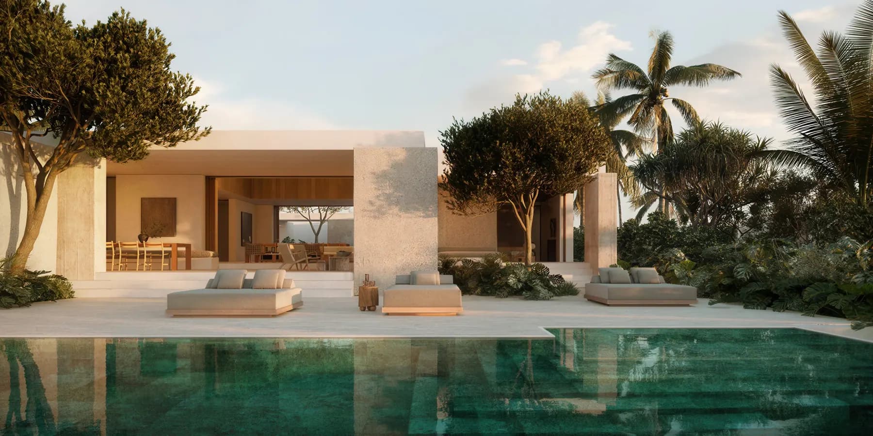 A beachfront residence and its pool at Janu Turks & Caicos, rendered.