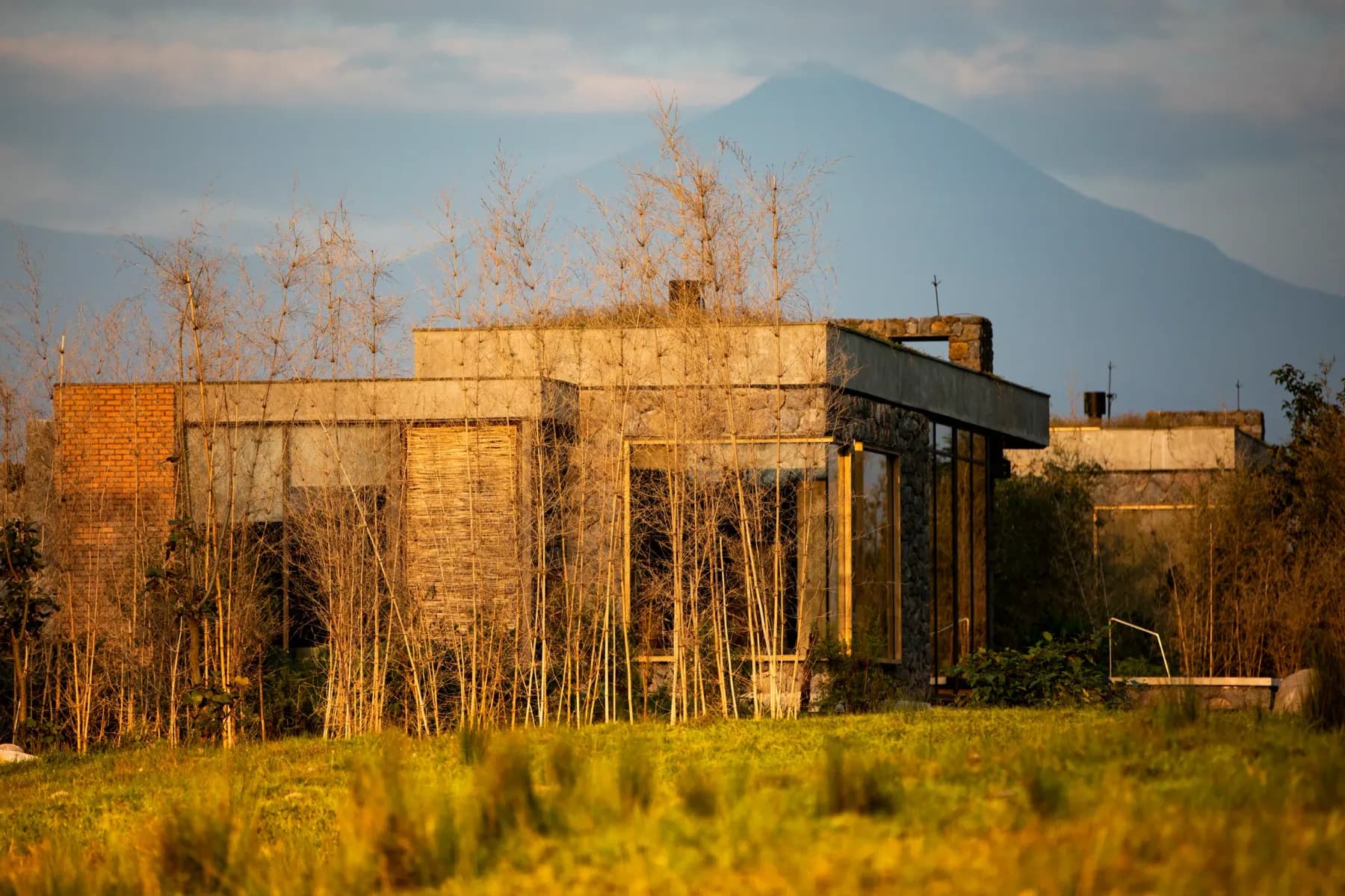 Singita Kataza House with a volcano behind