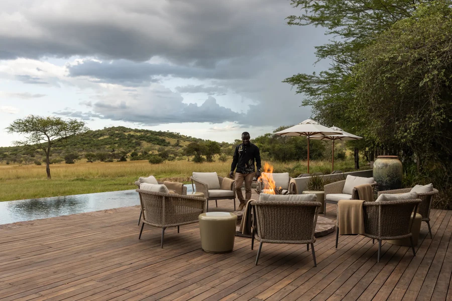 The fire pit and pool deck at Singita Serengeti House