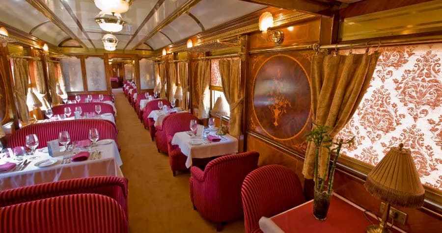 A restaurant car laid for dinner