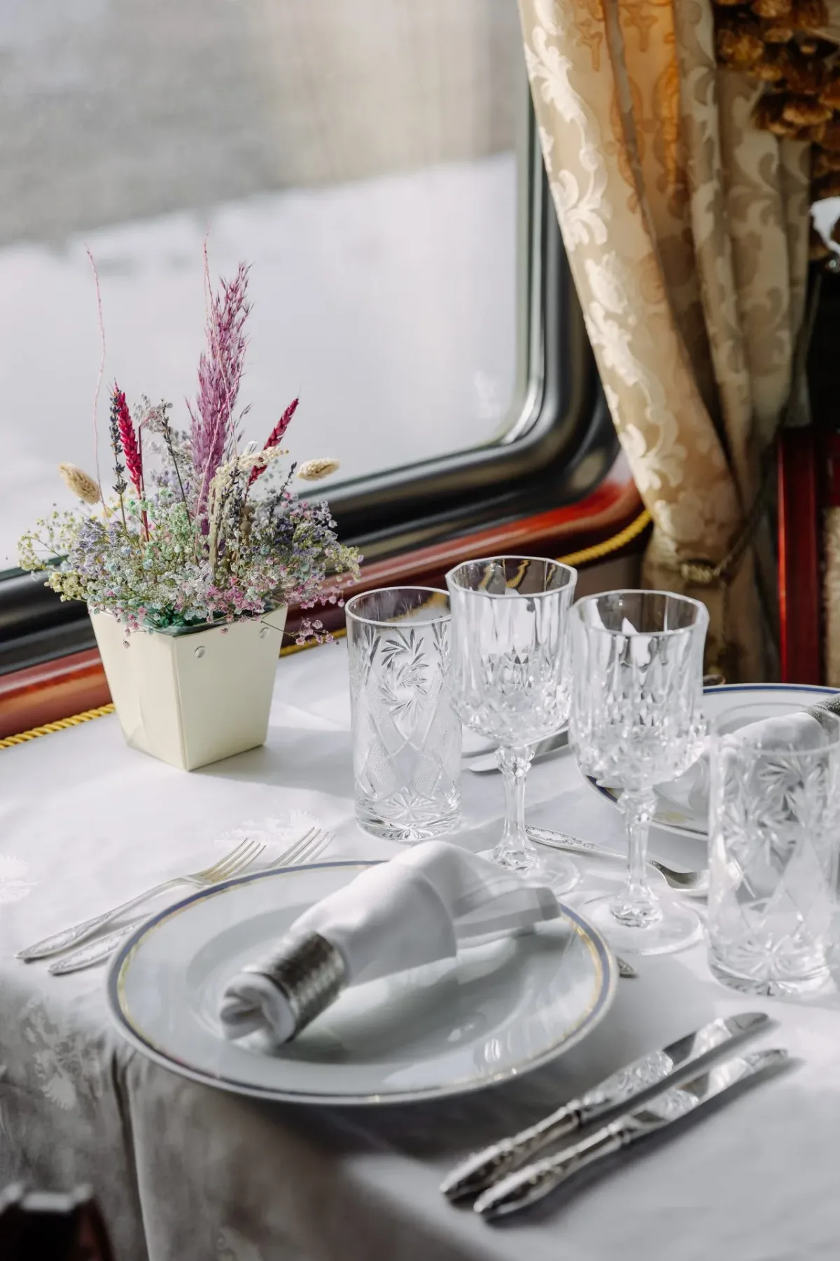 A table laid by the window