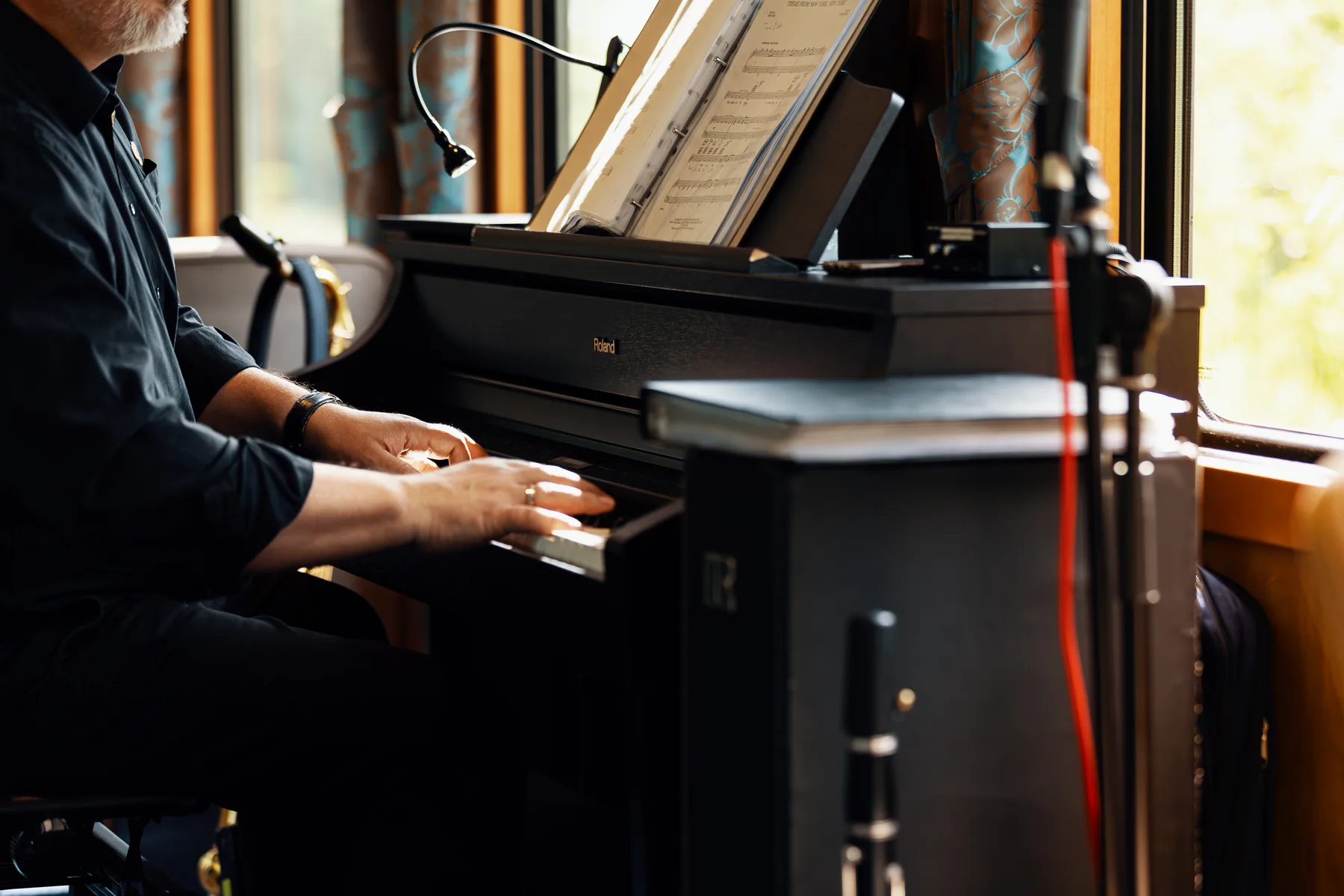 The resident pianist in the Bar Lounge Car
