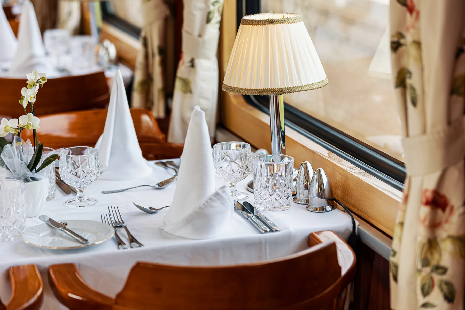 A table laid by the window