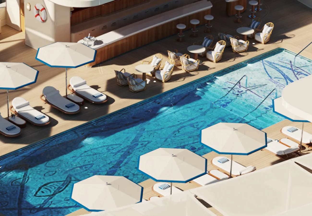 Loungers and parasols along the pool aboard Four Seasons I