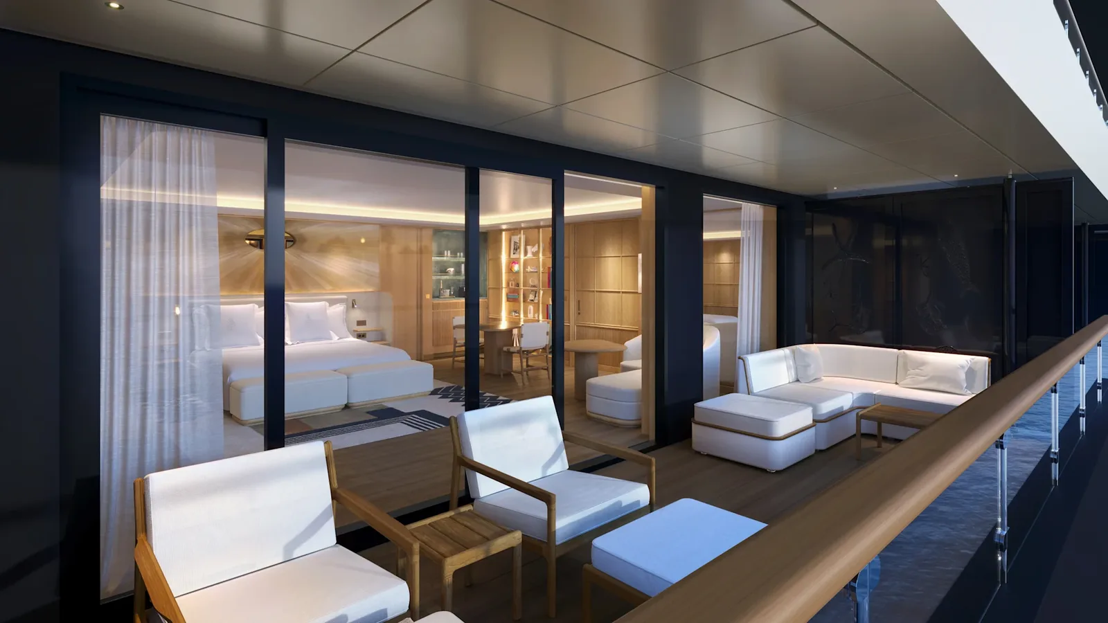 Superior Seaview Suite on Four Seasons I seen from its terrace at dusk: teak loungers and a sectional outside, the bedroom and sitting alcove lit behind the glass (Four Seasons rendering)