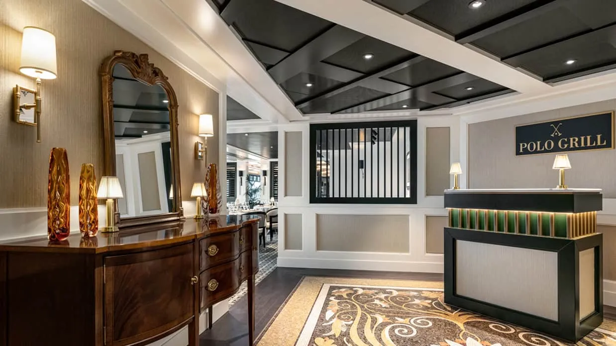 The entrance to Polo Grill on Oceania Vista, the steakhouse dining room beyond