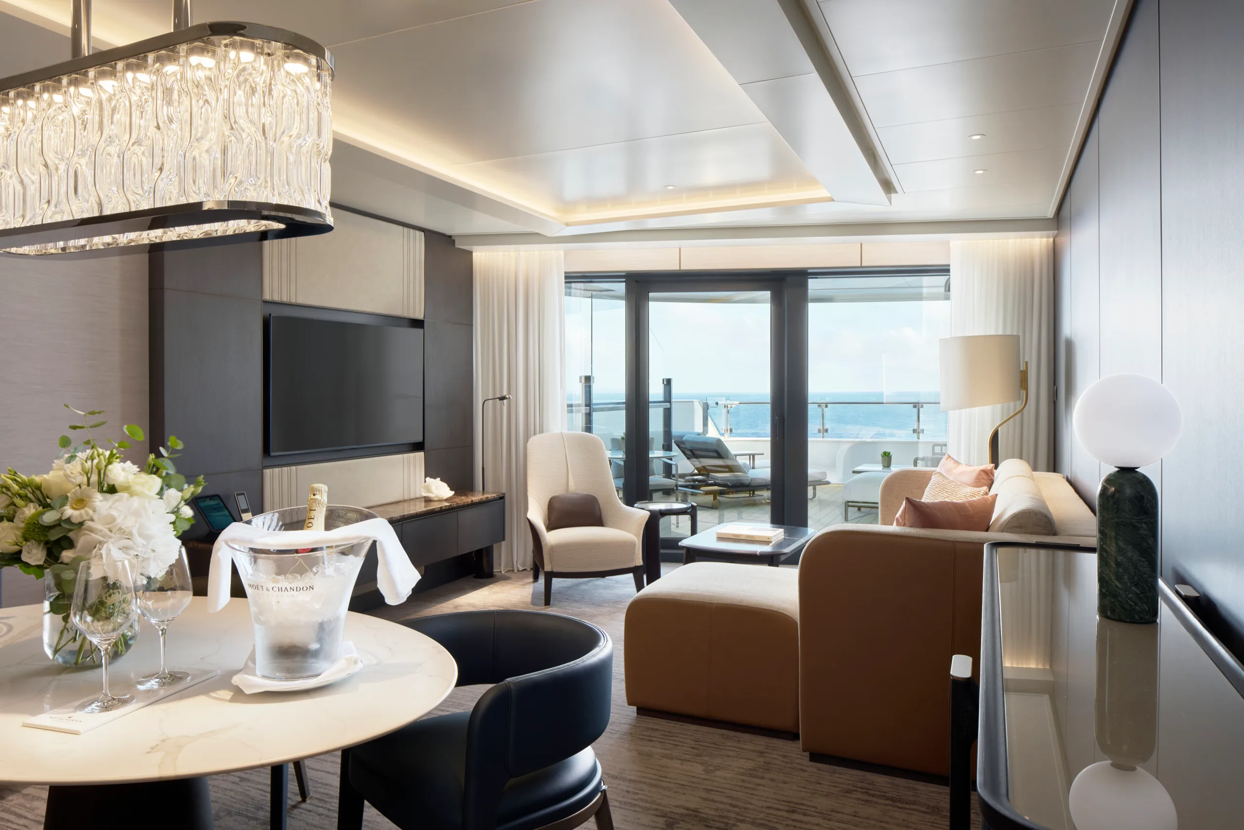 The Luminara Suite aboard Luminara, its living room opening onto the terrace