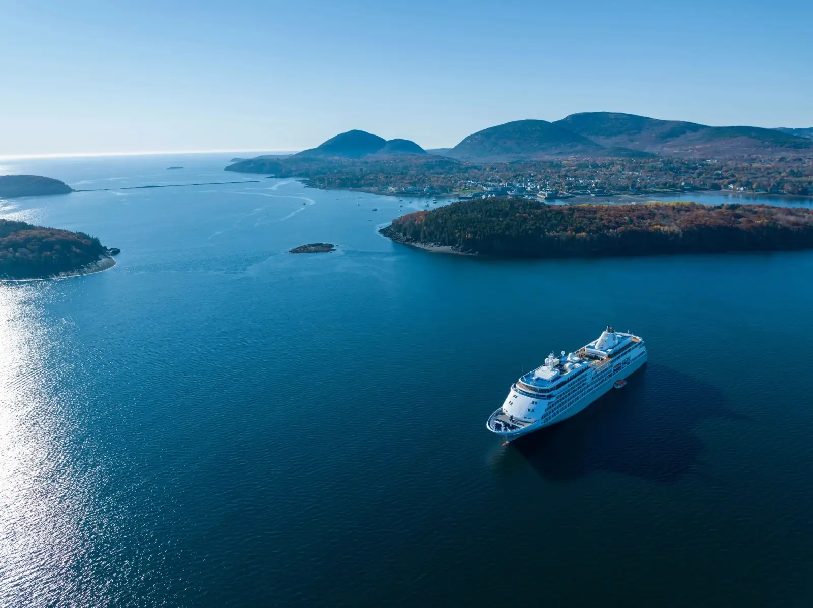Silver Whisper under way among wooded islands, seen from high above