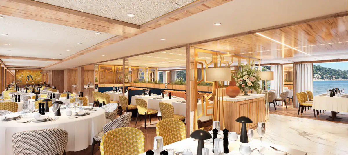 Rendering of the restaurant on S.S. São Rafael, round tables and yellow chairs, the river through the windows